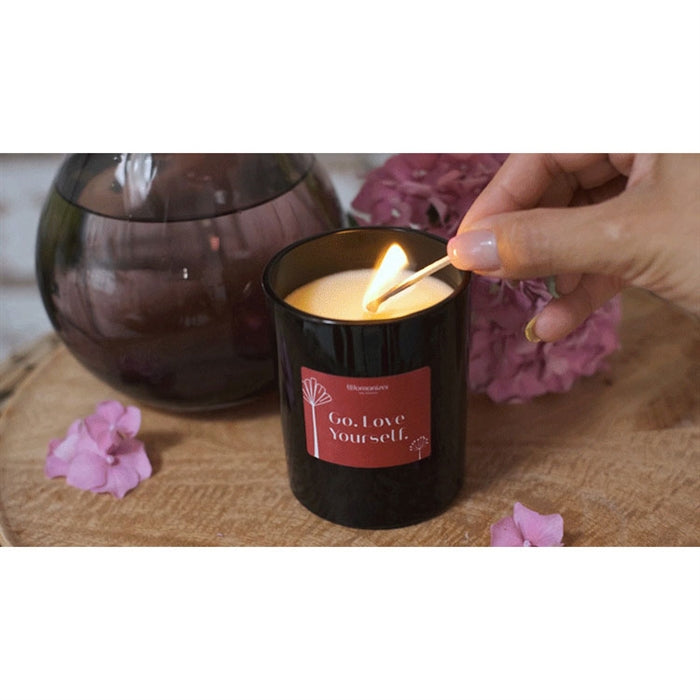 WOMANIZER SCENTED CANDLE