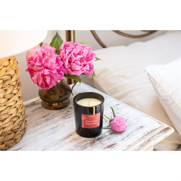 WOMANIZER SCENTED CANDLE